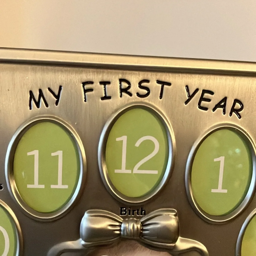 Baby’s First Year Photo Frame- Silver Finish 1 - 3”x5” 12 1.5”x2” openings New